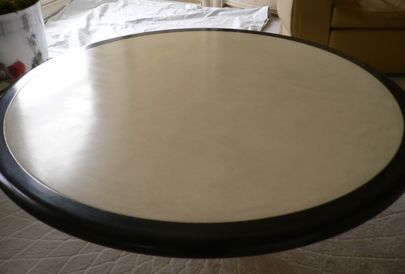 Faux graining to table surround, centre, parchment effect